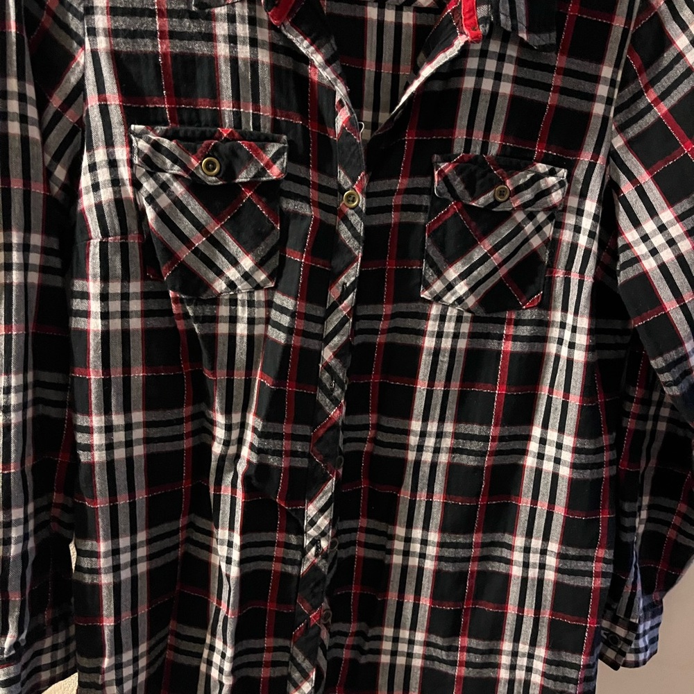 Woman’s medium flannel shirt